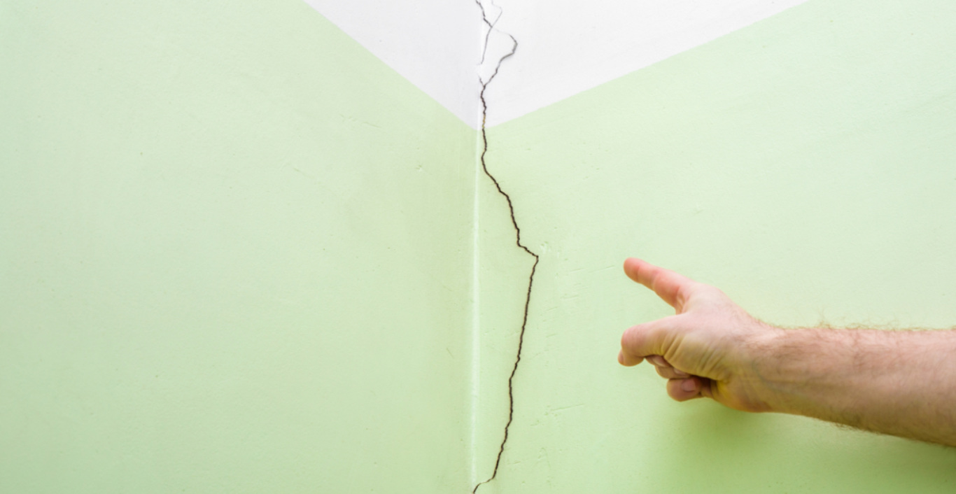 A hand showing a structural crack